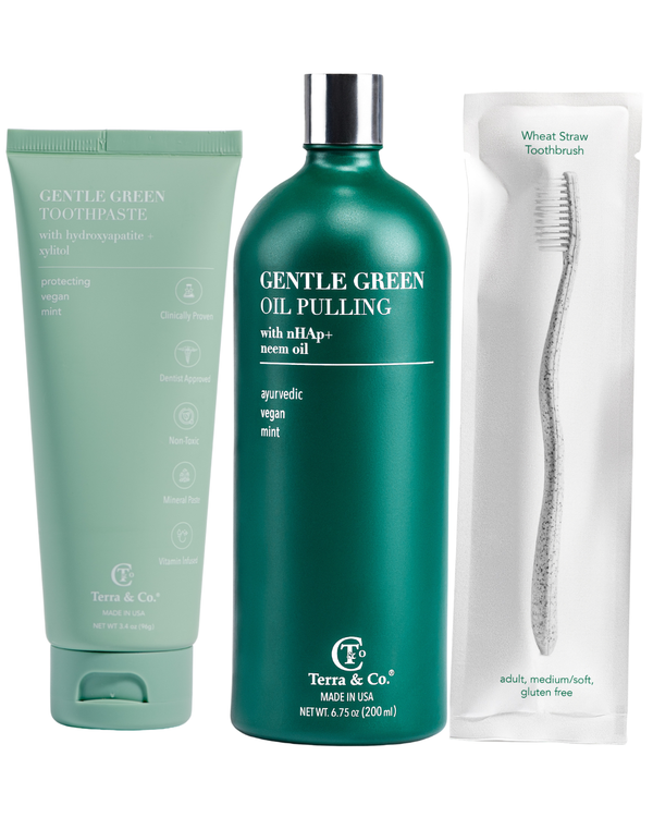 Gentle Green dental care products including toothpaste, oil pulling solution, and a toothbrush on a white background.