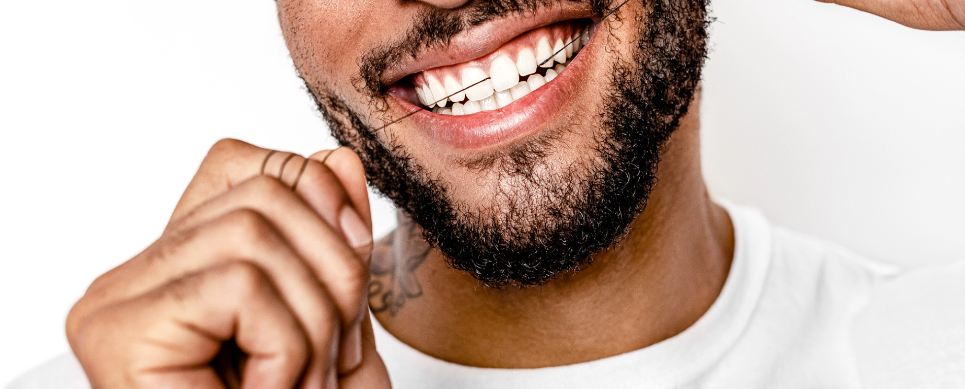 Man using Terra & Co. dental Floss