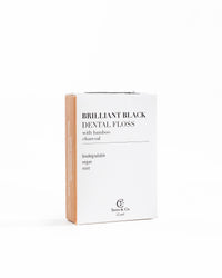 Brilliant Black® dental floss box by Terra & Co. with bamboo side panel – biodegradable, vegan, mint charcoal bamboo floss, 32 yards