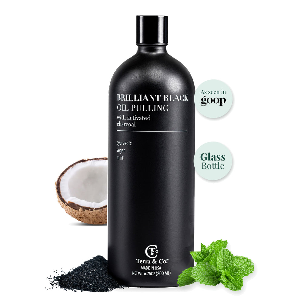 Terra & Co. Brilliant Black® charcoal oil pulling, 6.75 oz black glass bottle with coconut, activated charcoal powder and fresh mint – As seen in goop, glass bottle